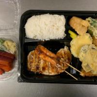 House Bento Box Entree · A combination of sashimi, chicken teriyaki, kushiyaki, gyoza, shumai and tempura. Served wit...