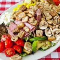The Antipasto Salad · Mixed greens, assorted cold cuts, hot peppers, provolone and grilled vegetables topped with ...