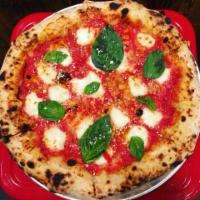 Pizza Margherita · Fresh mozzarella, red sauce and basil cooked well-done and finished with imported Tuscan ext...