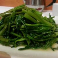 108. Sauteed Chinese Watercress · Served with spicy black bean sauce. Hot and spicy.