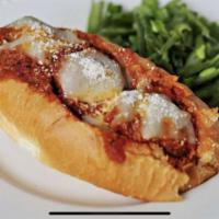 Meatball Sandwich · Our famous Italian meatballs oven-baked with our signature herbed marinara sauce. Served on ...