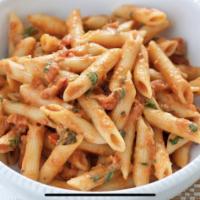 Penne Parmesan Pasta · Penne Pasta tossed in marinara sauce with or without Italian Cheese