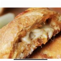 Buffalo Chicken and Bacon Calzone · Our tasty Buffalo chicken and bacon mix, stuffed with 100% mozzarella and crumbled blue chee...