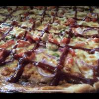 BBQ Chicken Pizza · A white pie with mozzarella, red onion, diced tomato, chicken and scallions, finished with y...