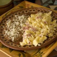Huevos con Jamon · 2 huevos revueltos con jamon acompañados con frijoles, arroz y tortillas de maiz o harina. 2...