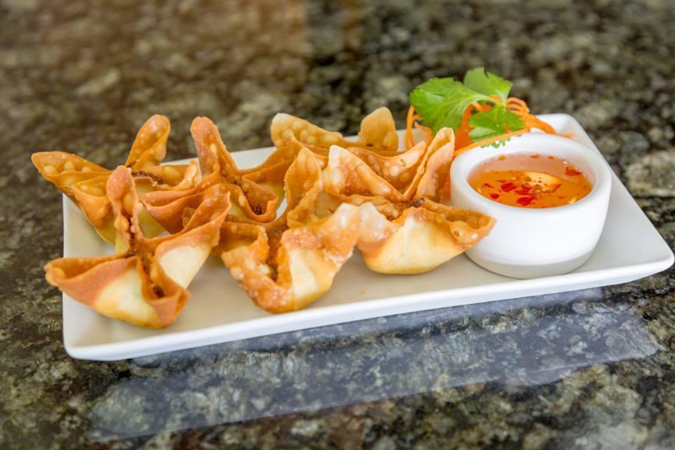 6 Crazy Crab Puffs · Crispy wonton pouches with cream cheese and crabmeat fillings, served with sweet and sour sauce.