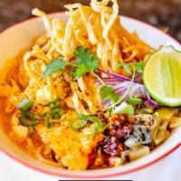 Khao Soi Curry Noodle · Northern Thai coconut curry noodle soup with your choice of meat.