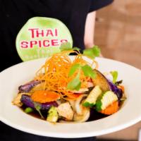 Thai Eggplant · Stir fried oriental eggplant with basil leaves, bell peppers, broccoli, carrots, onions and ...