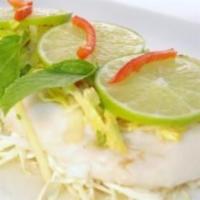 Phuket Lemon Fish · Steamed fish fillet with bell peppers, cabbage, green onions, mint and ginger in our light l...