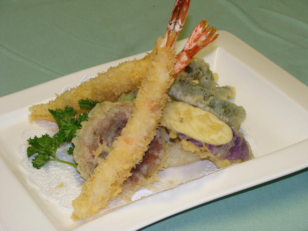 Shrimp and Vegetable Tempura App · Lightly battered and deep-fried shrimp and vegetables. Served with tempura sauce.