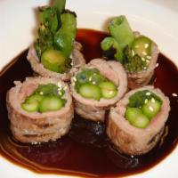 Beef Nagima · Scallions and asparagus with teriyaki sauce. Rolled in sirloin beef.