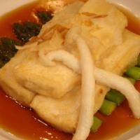 Agedashi Tofu · Deep-fried organic tofu, mushrooms and asparagus in light fish broth, topped with dried boni...
