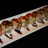 Alligator Roll  · Eel, crab stick, avocado, cucumber, and flying fish roe on top of shrimp tempura roll. Serve...
