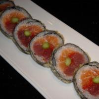 Delicious Roll · Raw. Tuna, salmon, asparagus, and flying fish roe in light tempura batter. Served with eel s...