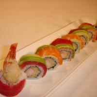 Luxury Roll · Raw. Tuna, salmon, and avocado on top of a shrimp tempura roll.