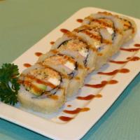 Seafood Tempura Roll  · Cooked salmon, crab, avocado, cream cheese, and flying-fish roe with tempura batter.