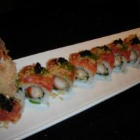 Sunset Roll · Raw. Spicy tuna and flying fish roe on top of a shrimp tempura roll with cucumber.