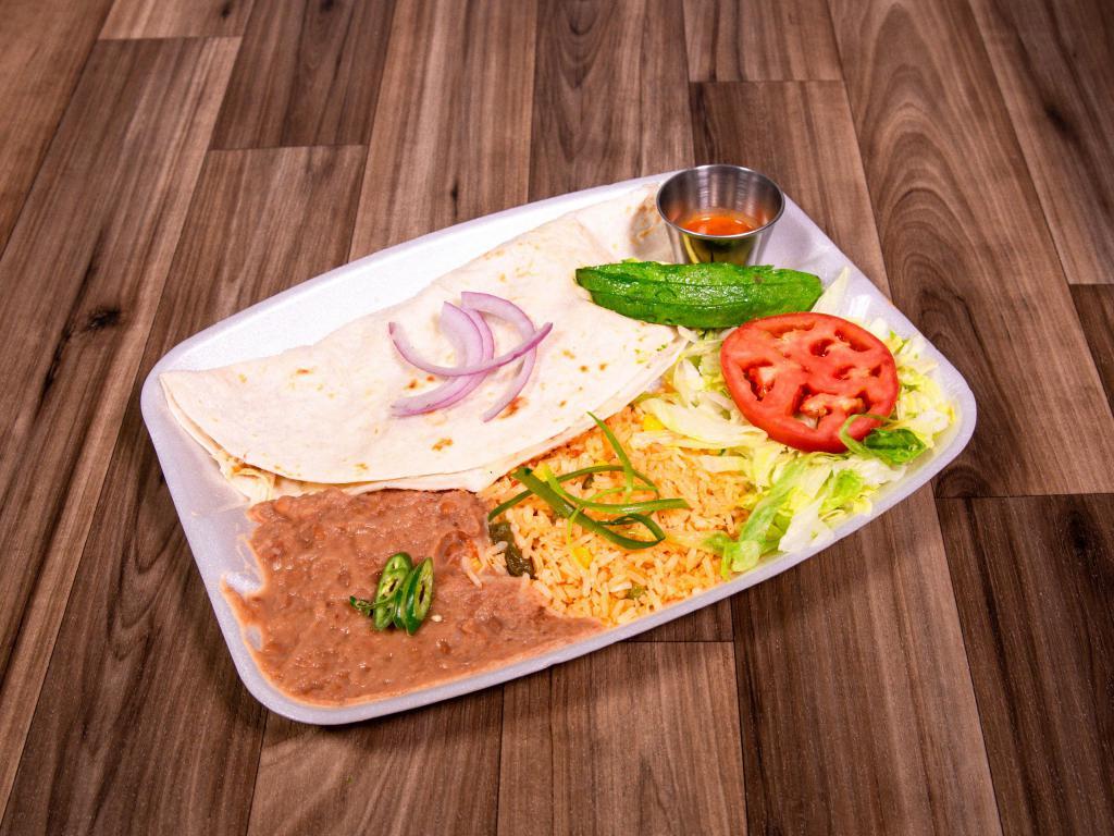 Quesadilla Plate · Prepared the traditional way, 2 Handmade Corn Tortillas filled with cheese & choice of meat, folded & closed, deep fried, then topped with Queso Fresco, Lettuce, & Tomatoes. Quesadillas served with sides of Salad, Refried Beans, Rice, Sour Cream, & Salsa.