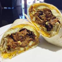 Pulled Pork Breakfast Burrito · Pulled Pork, Scrambled Eggs, Melted Cheese Wrapped in Flour Tortilla. Served with Chips & Sa...