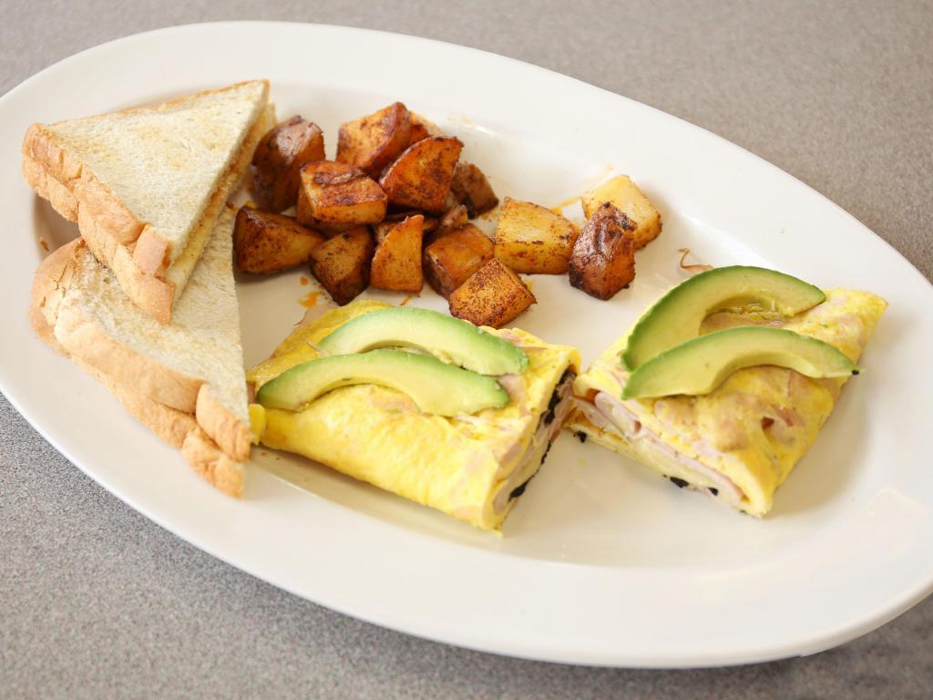 California Omelet · Turkey, avocado, nori and melted pepper jack cheese. Served with toast and home style potatoes.