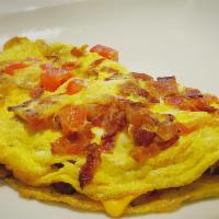 New Jersey Omelette · Crispy bacon, chopped tomato, melted American cheese.