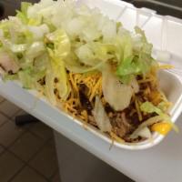 Frito Pie Kit (deconstructed) · Frito corn chips, nacho cheese, beans, pork, red chile, cheddar cheese, lettuce, onion and t...