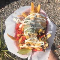 Hot Cheeto Carne Asada Fries · Its our Carne Asada fries with Hot Cheetos and Nacho Cheese. Includes Guacamole, Sour Cream,...