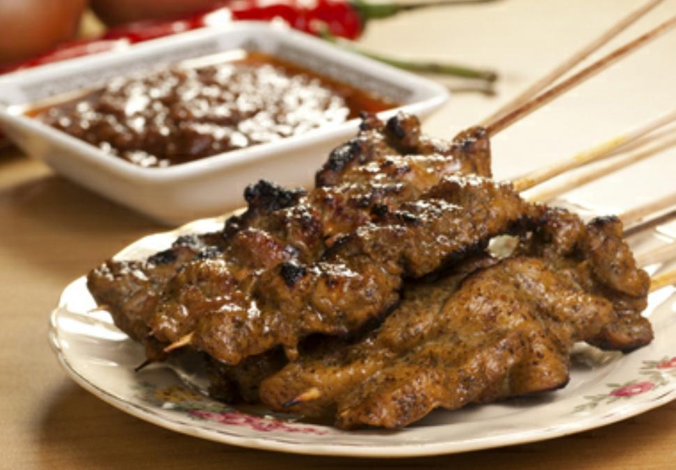 Beef Satay · Skewers of marinated beef served with peanut sauce and cucumber relish.