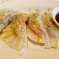 Steamed Vegetable Dumpling · Mixed vegetable dumplings with Thai soy sauce.