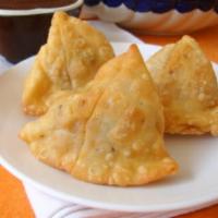 Fried Samosa Vegetable · Carrot, green pea and potato with sweet sauce.
