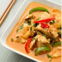 Red Curry · Bamboo shoot, bell pepper, basil, coconut milk and red curry paste. Served with white rice. ...