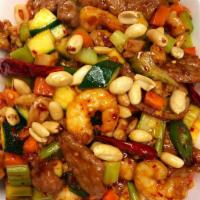 Kung Pao Combination · A combination of chicken, beef and shrimp with zucchini, celery, carrots and water chestnut ...