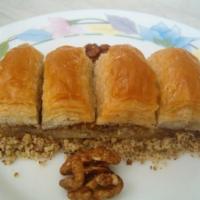 Baklava · Price per piece. Layered phyllo dough with walnut, pistachio filling and homemade syrup.