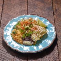 Enchiladas Suizas plate · 3 green chicken enchiladas with jack cheese and sour cream. Served with side of beans and ri...