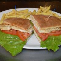 Grilled Chicken Sandwich · Made with grilled chicken, lettuce and tomato. Served with fries.