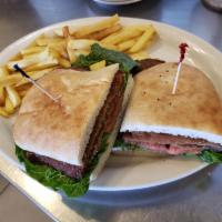 Milanese Sandwich · A breaded steak or chicken with lettuce and tomato. Served with fries.