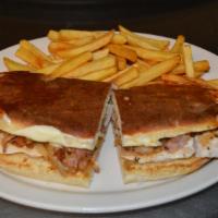 Chicken and Bacon Sandwich · Grilled chicken, bacon, sauteed onions, peppers and onion. Served with fries.
