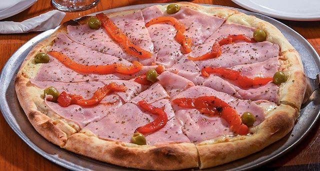 Especial Pizza · Made with tomato sauce, fresh mozzarella cheese, ham, red peppers, olives and oregano.