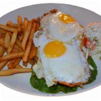 Chivito Al Plato · Steak, ham, cheese, eggs, bacon, lettuce, tomatoes, onions and peppers served with fries and...