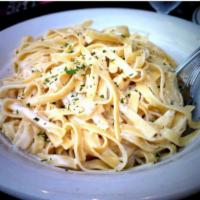 Fettucini Alfredo with Chicken · Delicious pasta with Alfredo sauce and chicken.