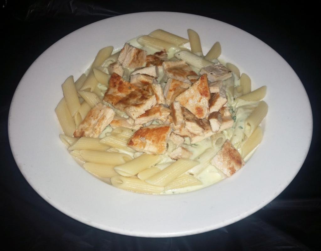 Provencal Chicken Penne Pasta · Penne pasta with chicken, garlic and parsley.