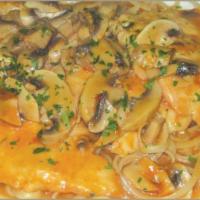 11. Chicken Marsala · Battered breast of chicken sauteed with imported Marsala wine and fresh mushrooms.