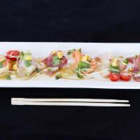 New Style Sashimi · Two salmon, two tuna, two yellowtail, jalapeno and cilantro with ponzu.