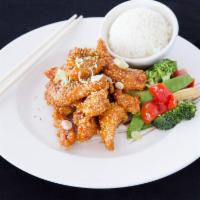 John Holly's Sesame Chicken · Strips of white meat chicken coated with sesame seed, slightly fried and stir-fried in mild/...