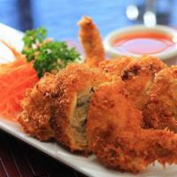 2 Pieces Thai Chicken Wings · Deep fried chicken wings stuffed with marinated ground chicken, glass noodles, mushroom and ...