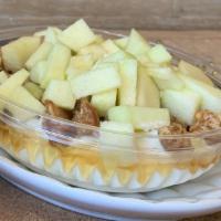 Apple Pie Greek Yogurt Parfait · Chopped green apples, granola, cinnamon and honey.