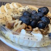 Chia Yogurt Power Parfait · Greek yogurt, chia seeds, banana, blueberries, walnuts, and agave.