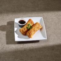 2 Piece Egg Roll · Savory filling wrapped in a paper thin wrapper and deep-fried.