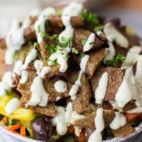 Lamb & Beef Gyro Salad · With choice of sauce. Served with lettuce, tomatoes, onions, cucumber, and parsley.