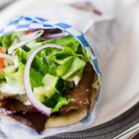 Lamb & Beef Gyro Pita · With choice of sauce. Served with lettuce, tomatoes, onion, cucumber, and parsley.